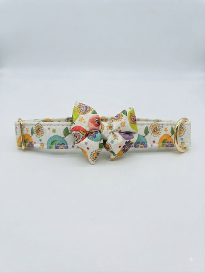LuckyPaws floral pet collar with attached bow tie and detachable bow, featuring colorful floral pattern and adjustable strap.