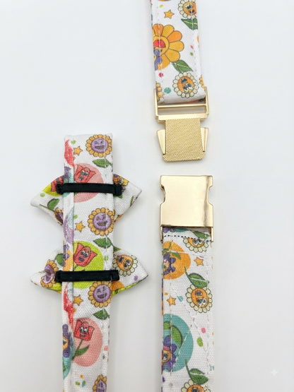 LuckyPaws floral pet collar with a detachable bow tie, featuring a colorful floral pattern and adjustable strap for a comfortable fit.