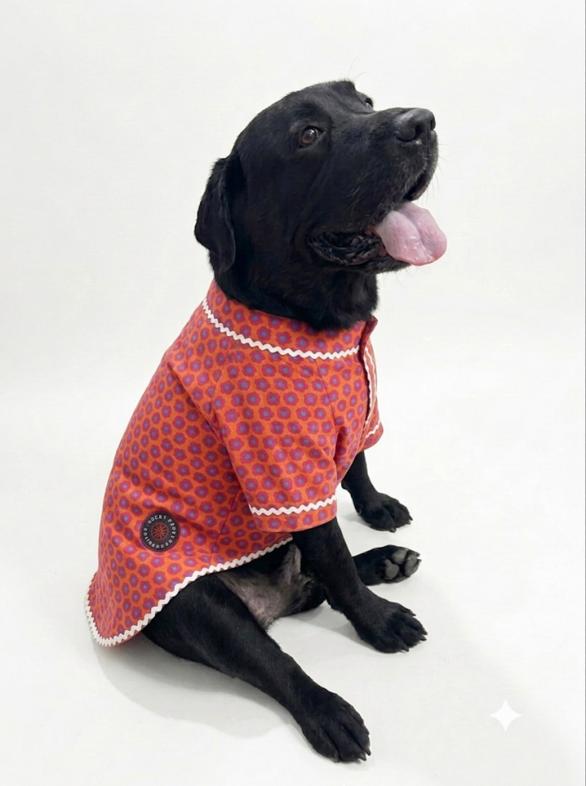 LuckyPaws royal orange ethnic floral kurta with intricate embroidery and vibrant patterns on lightweight fabric.
